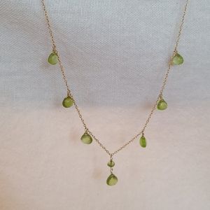 Peridot and gold necklace